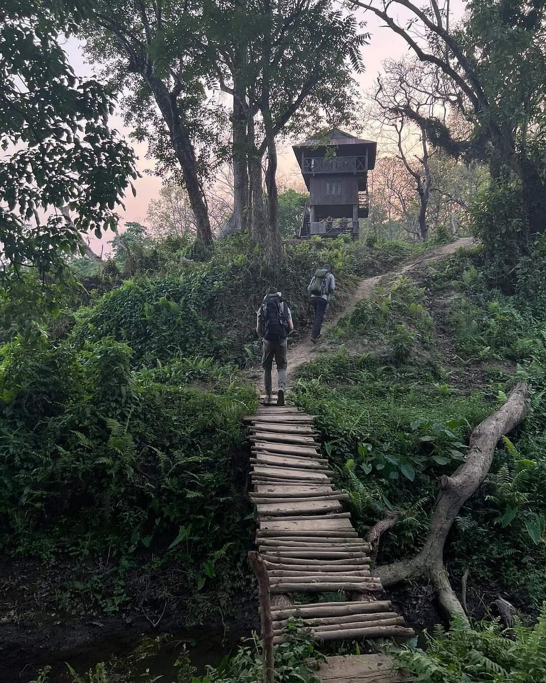 Crossing the wooden bridge to the village